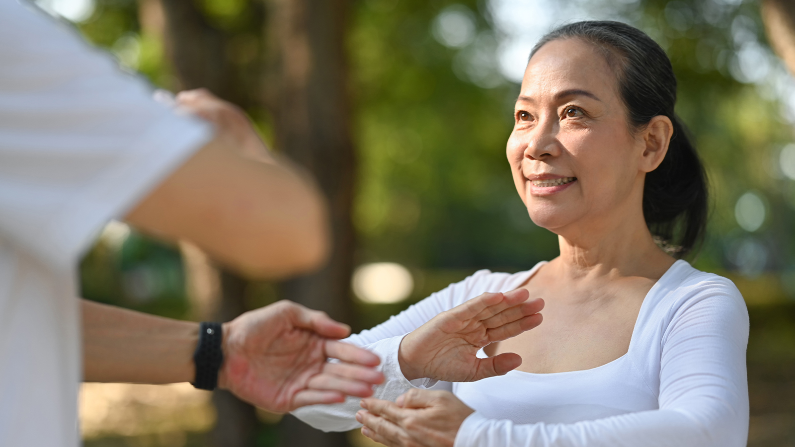 Senior with dementia doing tai chi in Houston